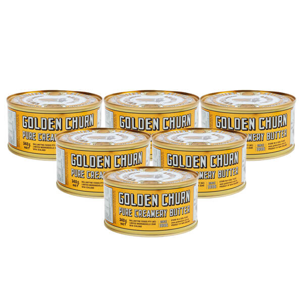 A 6 pack of tin can of Golden Churn Pure Creamery Butter, 340g net weight, with yellow and white label.