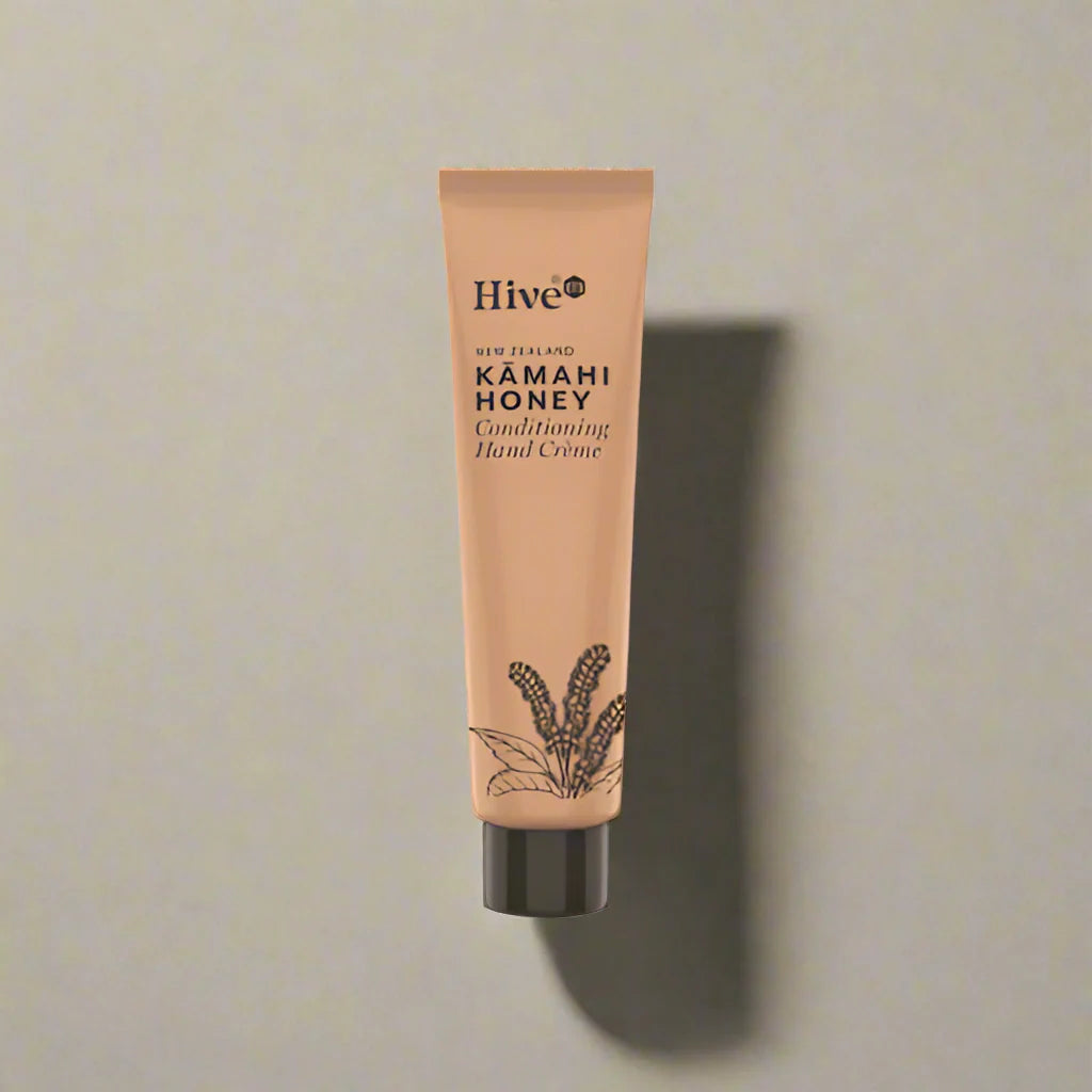 Tube of Hive Kamahi Honey Conditioning Hand Creme on a beige background