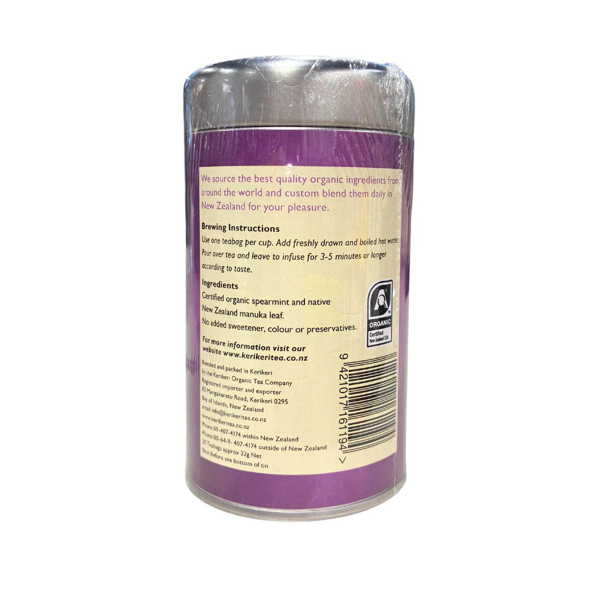 A cylindrical plastic canister of Kauri Tea Company organic ingredients, showing the back label with brewing instructions and a barcode on a white background.