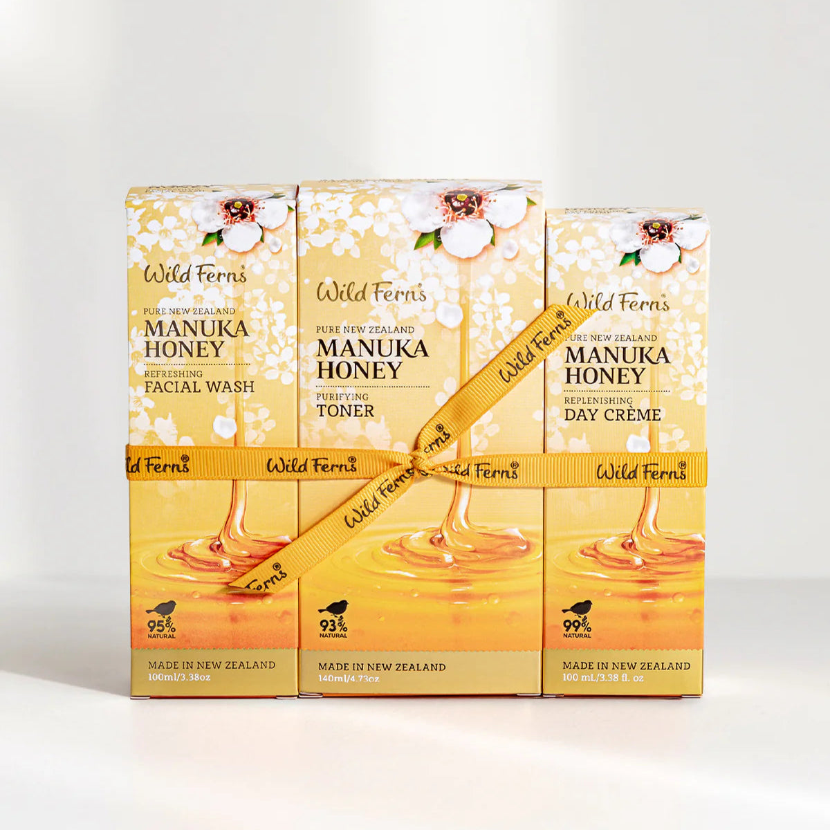 Set of Wild Ferns Manuka Honey skincare products on a white background