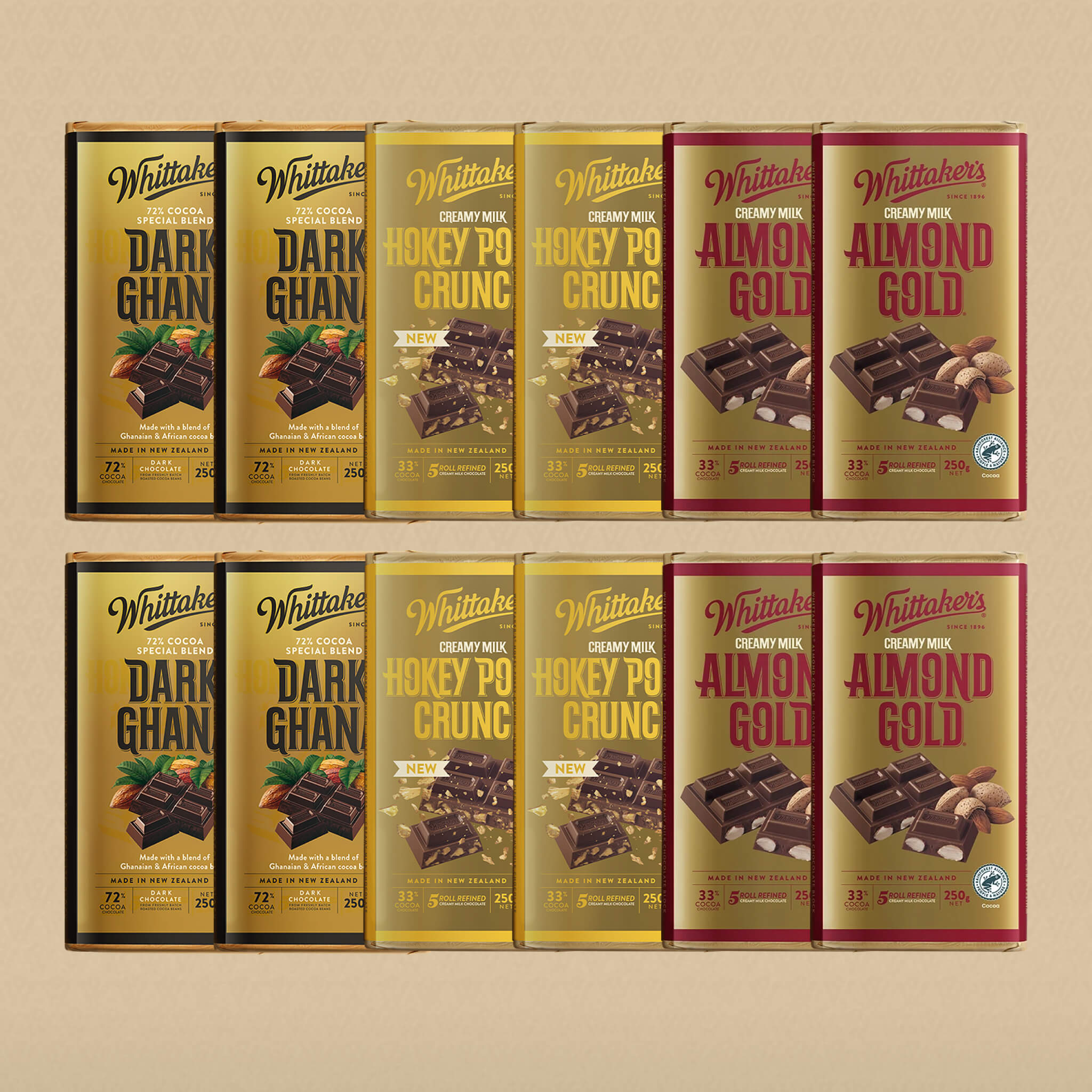 Collection of Whittaker's chocolate bars in various flavors on a beige background