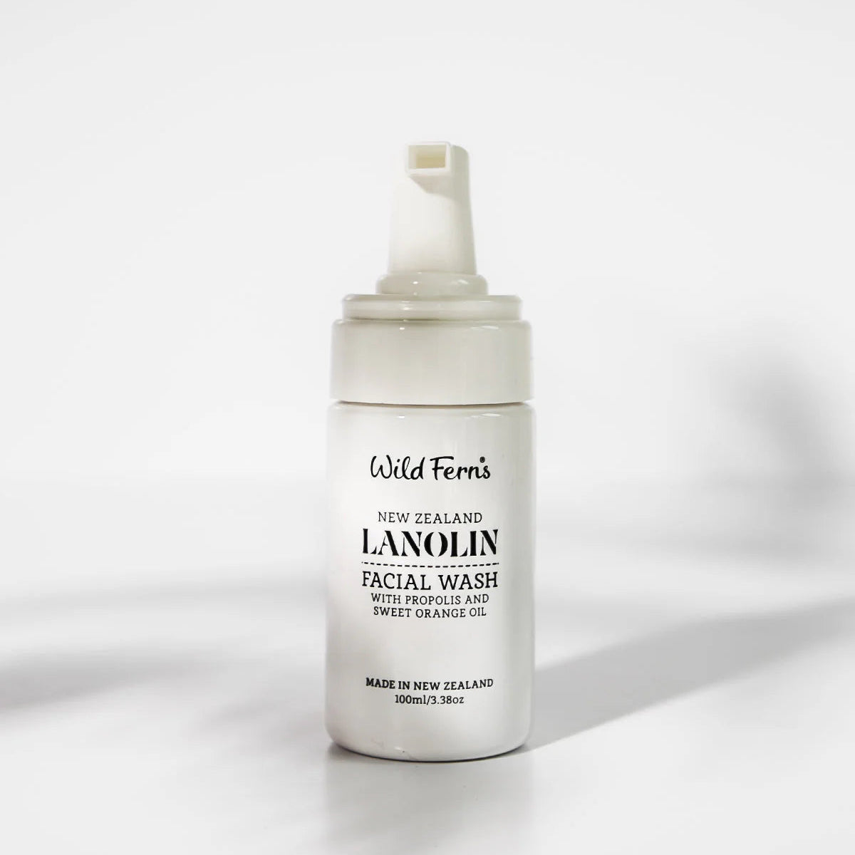 White bottle of Wild Ferns Lanolin Facial Wash on a white background