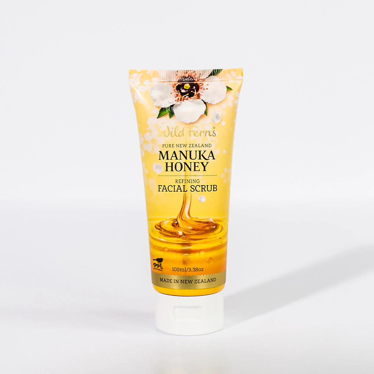 Tube of Wild Fern's Manuka Honey facial scrub on a white background