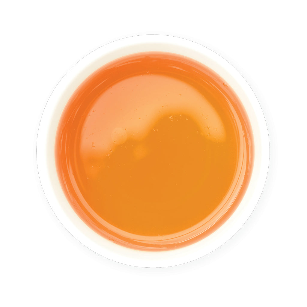 Zealong Tea in a small container on a white background