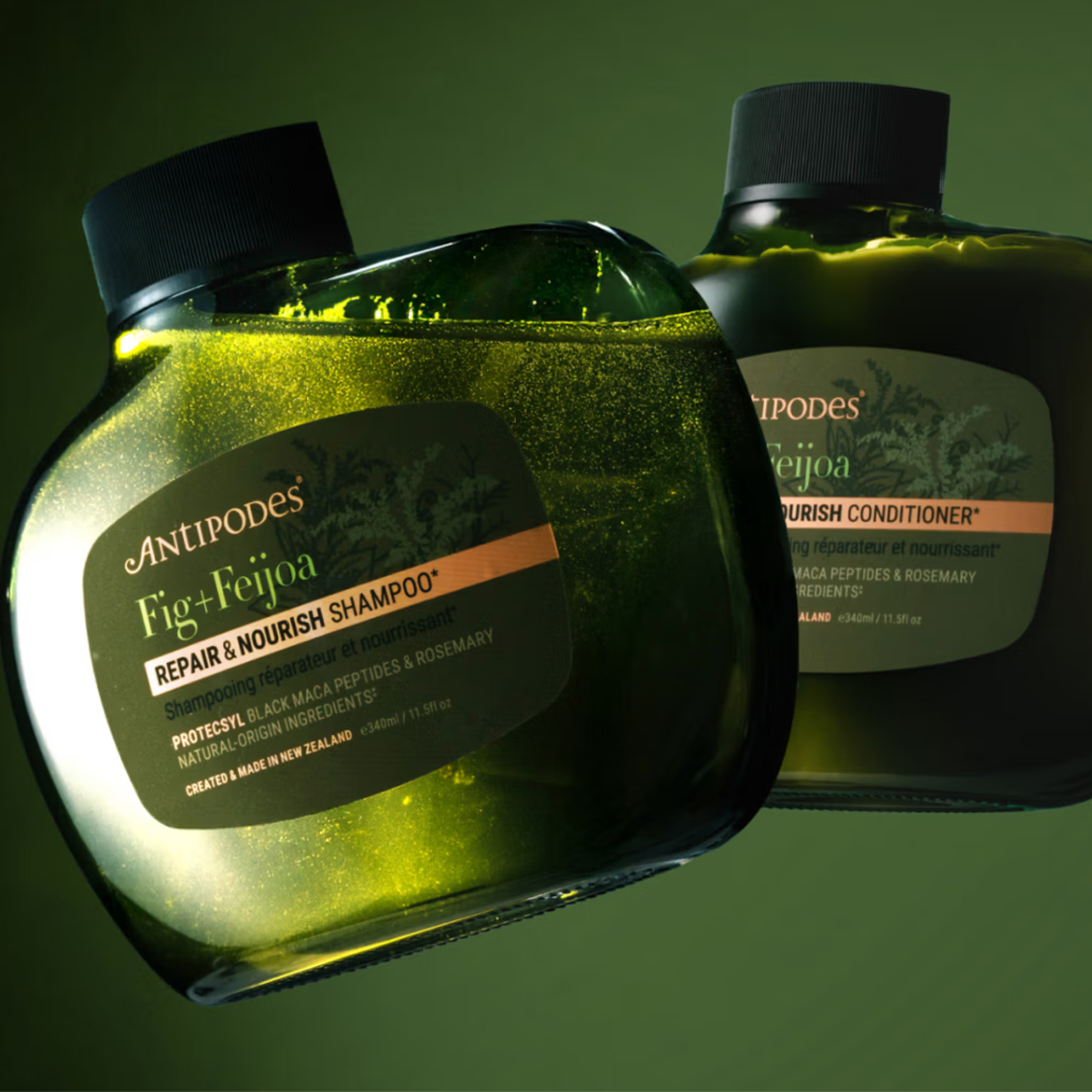 Two Antipodes Fig & Feijoa hair care products on a green background