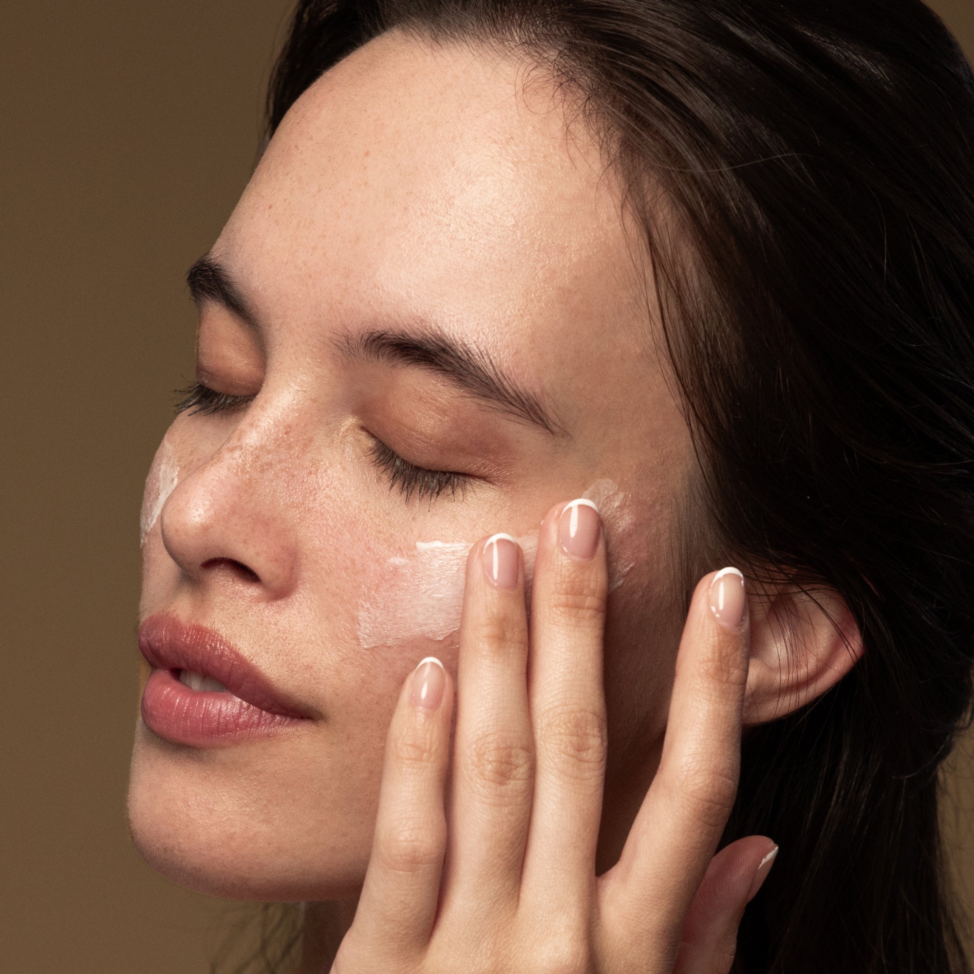 A lady with Andipodes Lime Cavier on her face
