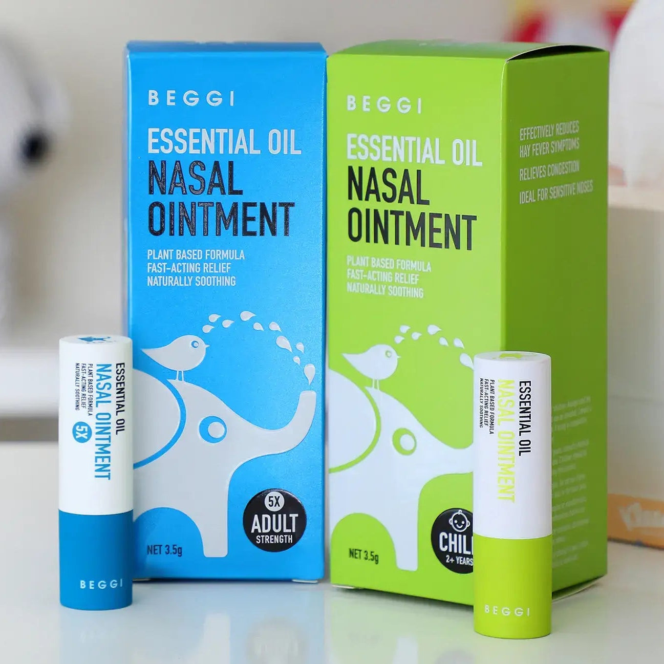 Beggi Essential Oil Nasal Ointment packaging on a blurred background
