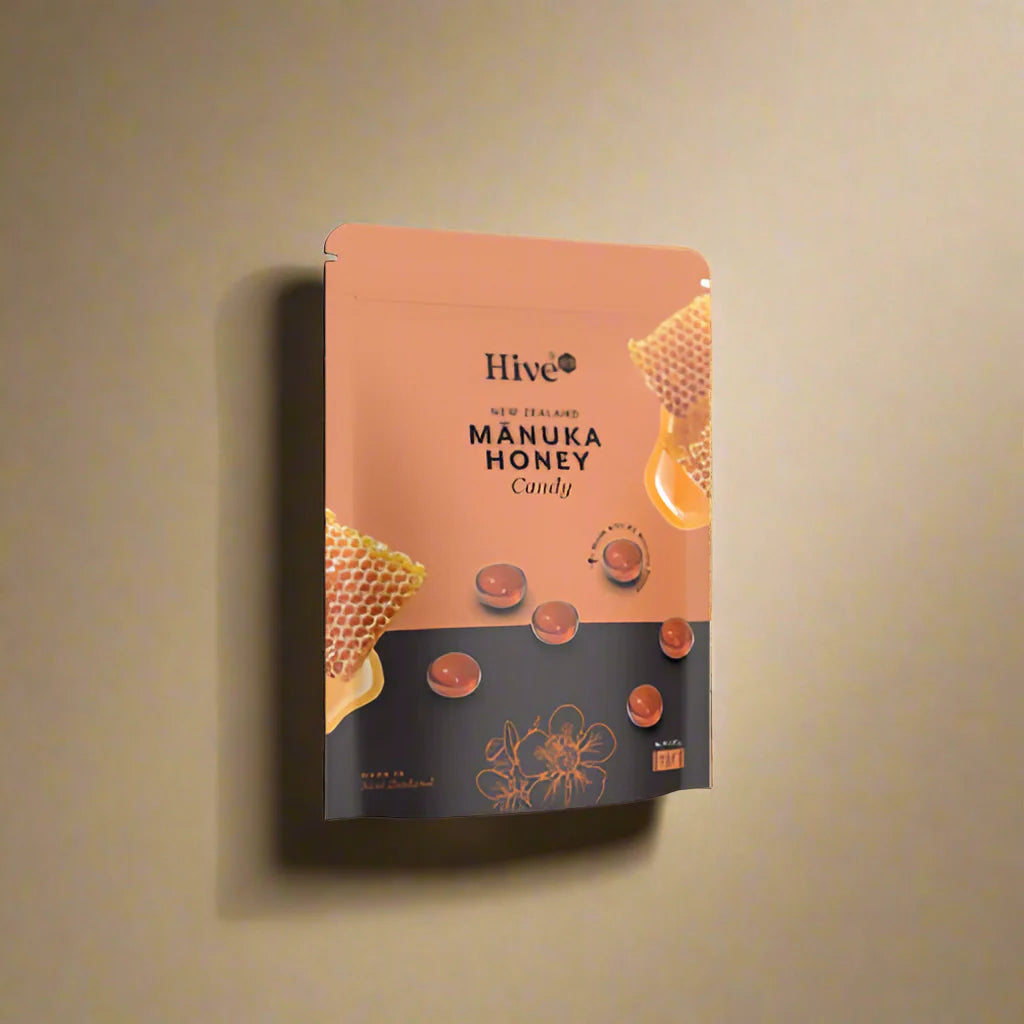 Hive Manuka Honey candy packaging on a beige background