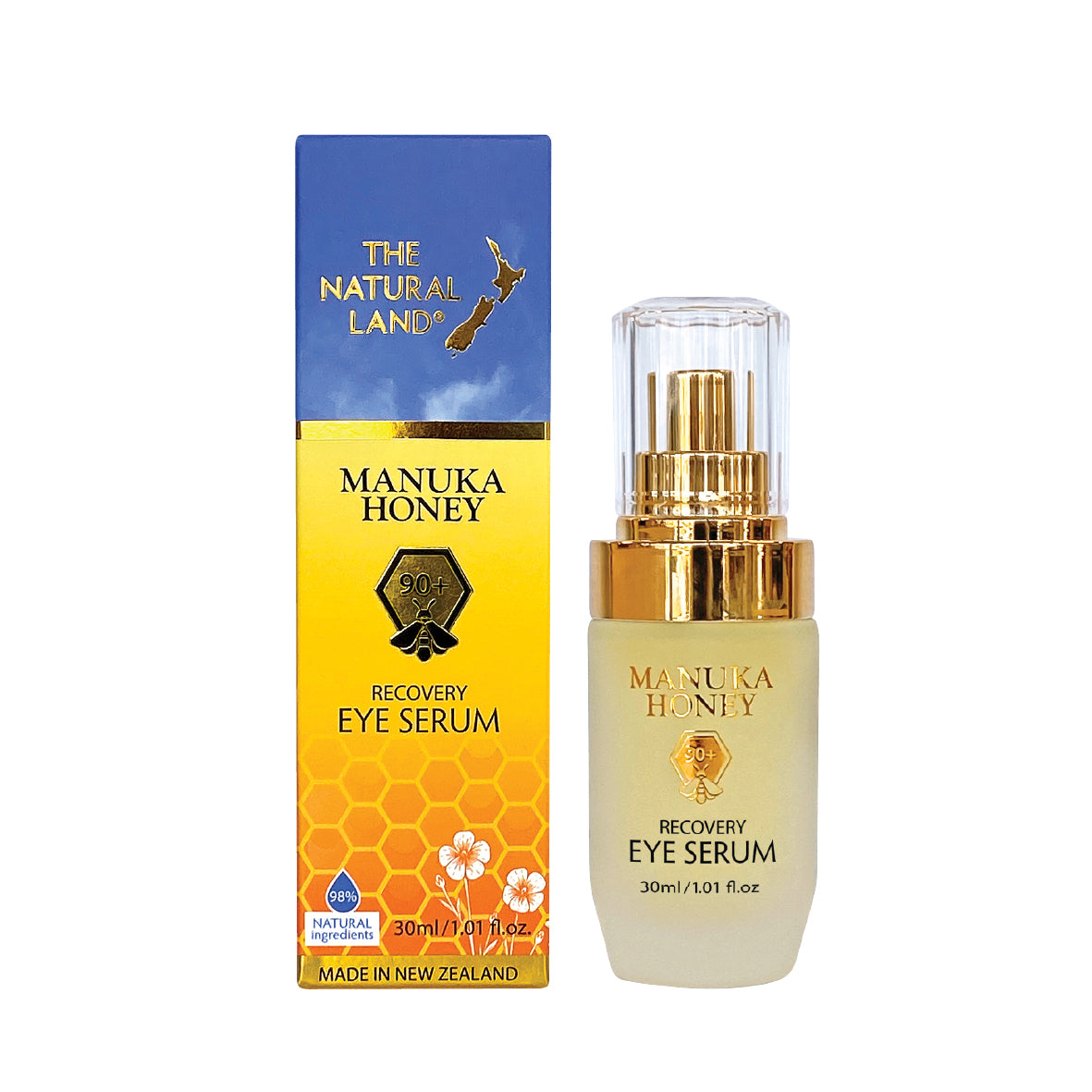 Product packaging and container for The Natural Land Manuka Honey Recovery Eye Serum, showing a box with yellow and blue design elements and a clear bottle with gold cap containing the serum.