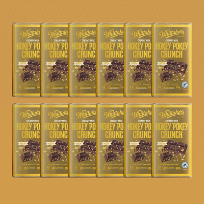 12 blocks of Whittaker's Honey Pokey Crunch chocolatee block on a yellow background