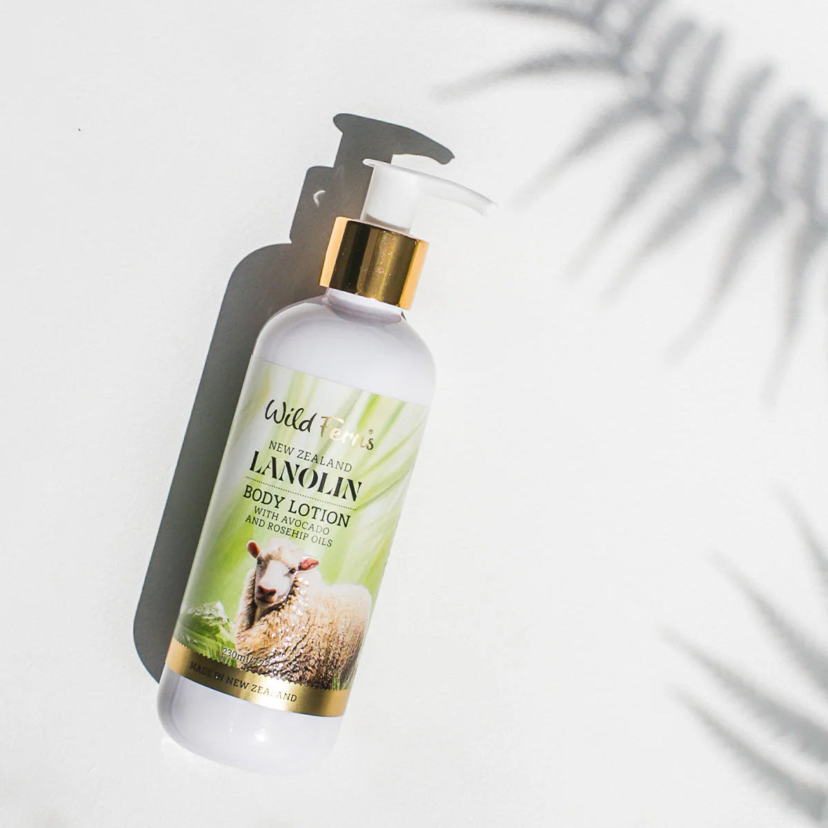 Wild Ferns Lanolin Body lotion bottle with a label featuring an animal, on a light background