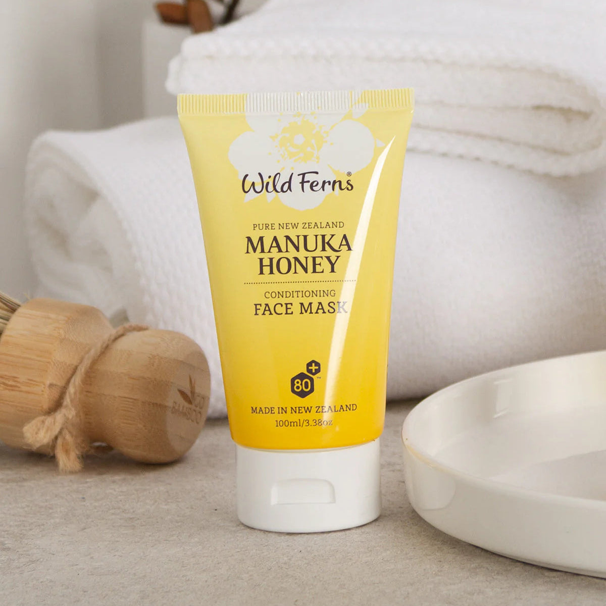 Manuka Honey Face Mask tube by Wild Ferns on a neutral background