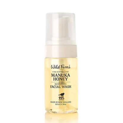 Facial wash bottle labeled 'Manuka Honey' by Wild Ferns on a white background