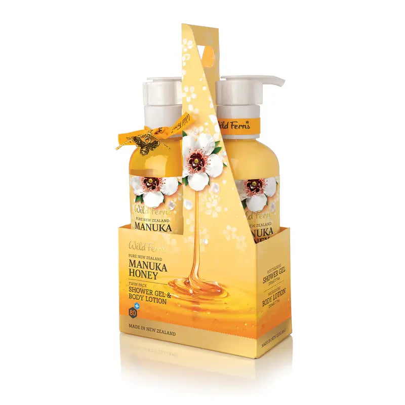 Manuka Honey shower gel and body lotion set with packaging on a white background