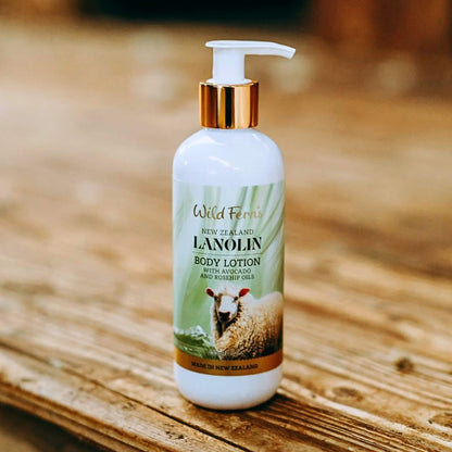 Wild Ferns Lanolin body lotion bottle on a wooden surface